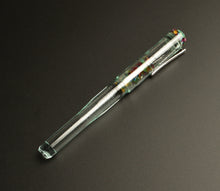 Load image into Gallery viewer, The Franklin-Christoph Model 02 Intrinsic – Antique Glass &amp; Cathedral SE fountain pen rests diagonally on a dark surface.