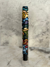 Load image into Gallery viewer, Franklin-Christoph’s 03 A.A. Vacaharat Cathedral of Nature pen stands upright on a marble surface.