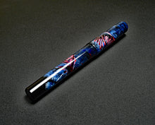 Load image into Gallery viewer, Franklin-Christoph 03M A.A. Vacharat Murder of Crows pen with blue, black &amp; red marbling on a dark surface.