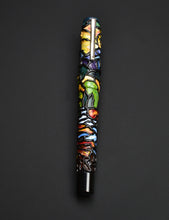 Load image into Gallery viewer, The 03 A.A. Vacaharat Cathedral of Nature pen by Franklin-Christoph rests on a black background, rich in detail.