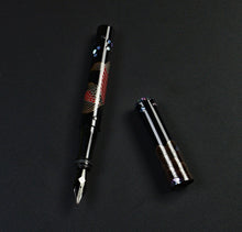 Load image into Gallery viewer, Franklin-Christoph Model 03M Arowana Limited Edition FP with maki-e fish art, cap resting beside the fountain pen.