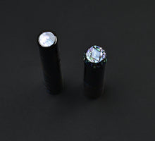 Load image into Gallery viewer, Two Franklin-Christoph Model 03M Arowana Limited Edition fountain pens rest on a dark surface.