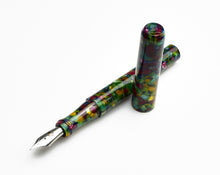 Load image into Gallery viewer, A vibrant Franklin-Christoph Model 03 Modified Cathedral fountain pen sits uncapped on a white background.