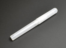 Load image into Gallery viewer, Franklin-Christoph Model 03 Modified Fountain Pen - Ghost, translucent white cylinder, on a dark gray surface.