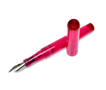 Load image into Gallery viewer, A Franklin-Christoph Model 03 Modified Fountain Pen - Ruby, uncapped, rests on a white background.