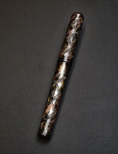 Load image into Gallery viewer, Franklin-Christoph 03M SCF Artisan Engraved Ancienne: glossy black pen with brown-black marbled crisscross design.