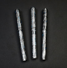 Load image into Gallery viewer, Three Franklin-Christoph 03M Artisan Engraved Delrin pens feature silver gothic patterns on a black background.