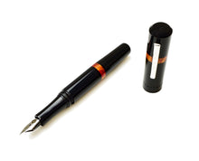 Load image into Gallery viewer, The Franklin-Christoph Model 19 Black Fire SE fountain pen, uncapped with silver nib and cap, displayed on white.