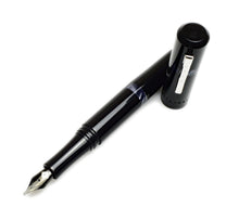 Load image into Gallery viewer, Franklin-Christoph Model 19 Fountain Pen - Black &amp; Smoke, #6 nib, acrylic body, shown diagonally on white.