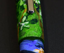 Load image into Gallery viewer, Close-up of Franklin-Christoph 20 A.A. Vacharat - Dreaming of Spring pen with floral art, silver clip, dark backdrop.