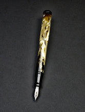 Load image into Gallery viewer, A Franklin-Christoph Model 20 Marietta Cold Brew SE fountain pen with silver nib rests on a dark, plain background.