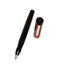 Load image into Gallery viewer, Franklin-Christoph Model 20 Copper Rising Rollerball with cap removed, placed beside pen on a white background.