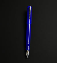 Load image into Gallery viewer, The Franklin-Christoph Model 20 Marietta Fountain Pen in Kyanite with a silver nib rests on a plain black surface.
