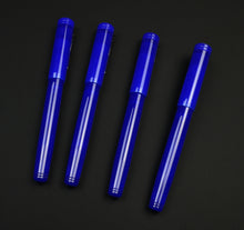 Load image into Gallery viewer, Four Franklin-Christoph Model 20 Marietta Kyanite fountain pens are arranged in a row on a black background.