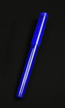 Load image into Gallery viewer, A Franklin-Christoph Model 20 Marietta Fountain Pen in Kyanite rests on black, its vivid blue standing out.