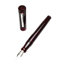 Load image into Gallery viewer, A Franklin-Christoph Model 20 Marietta FP - Tiger Red with its #6 nib exposed, cap beside it on a white surface.