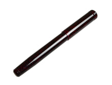 Load image into Gallery viewer, The Franklin-Christoph Model 20 Marietta FP - Tiger Red pen with a glossy finish lies diagonally on a white background.