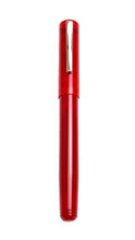Load image into Gallery viewer, A closed Franklin-Christoph Model 20 Venetian Red Rollerball with silver clip stands upright on a white background.