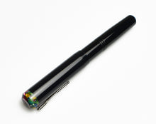 Load image into Gallery viewer, Franklin-Christoph Model 31 Omnis Black Cathedral fountain pen with a colorful translucent finial on white background.