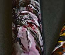 Load image into Gallery viewer, Close-up of the Franklin-Christoph 33 A.A. Vacharat Gothic City art pen with red, white, black &amp; pink swirls.