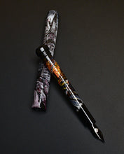 Load image into Gallery viewer, Franklin-Christoph 33 A.A. Vacharat Gothic City pen: detailed cityscape on barrel and cap, set against darkness.