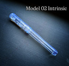 Load image into Gallery viewer, Franklin-Christoph Model 02 Intrinsic Italian Ice clear fountain pen with #6 nib on a dark textured surface.