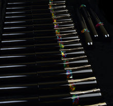 Load image into Gallery viewer, Franklin-Christoph Model 40 Panther Fountain Pens - Black Cathedral are arranged with silver clips in the display case.