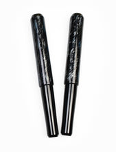 Load image into Gallery viewer, A silver-blue Franklin-Christoph 40M SCF Art fountain pen with a marbled finish, shown parallel on a white surface.
