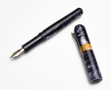 Load image into Gallery viewer, Franklin-Christoph Model 40 Panther Fountain Pen in Smoke &amp; Orange SE, silver nib, on a white background.