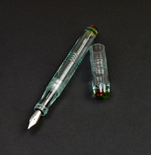 Load image into Gallery viewer, Franklin-Christoph Model 45 Cor - Antique Glass Cathedral Fountain Pen with silver nib and cap on a black surface.