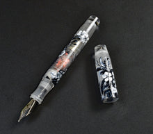 Load image into Gallery viewer, Franklin-Christoph 46 A.A. Vacharat - Gothic Blossoms is shown uncapped, clear acrylic with white floral designs.