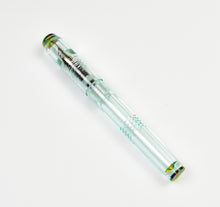 Load image into Gallery viewer, Franklin-Christoph Model 46 Cor FP - Antique Glass &amp; Cathedral, capped, with a greenish tint on white background.