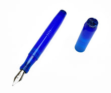 Load image into Gallery viewer, A Franklin-Christoph Model 46 Caribbean Bluestone FP (Original Long) rests uncapped on a white background.
