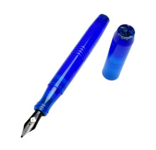 Load image into Gallery viewer, A Franklin-Christoph Model 46 Caribbean Bluestone FP (Original Long) with a #6 nib lies uncapped on white.
