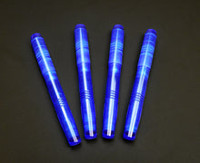 Load image into Gallery viewer, Four Franklin-Christoph Model 46 Cor FP Maya Kyanite pens are fanned out on a black background.