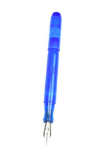 Load image into Gallery viewer, A Franklin-Christoph Model 46 Cor FP Maya Kyanite pen with a silver nib stands upright on a white background.