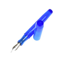 Load image into Gallery viewer, A Franklin-Christoph Model 46 Cor FP Maya Kyanite rests uncapped with its cap beside it on a white background.