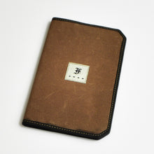 Load image into Gallery viewer, Franklin-Christoph 5.3 Pocket Notebook Cover in brown canvas with black trim and a white “F” patch on the front.
