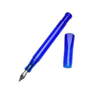 Load image into Gallery viewer, A Franklin-Christoph Model 50 Grandis Fountain Pen in Caribbean Blue lies uncapped next to its cap on white.