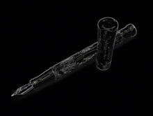 Load image into Gallery viewer, A luminous Franklin-Christoph Model 50 Grandis—Dark Room Emulsion pen and cap float on a sleek black backdrop.