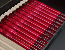 Load image into Gallery viewer, A box of Franklin-Christoph Model 50 Grandis Fountain Pens - Ruby, each in its own slot with transparent barrels.