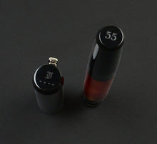 Load image into Gallery viewer, A Fountain pen with a cap and barrel standing upright 
