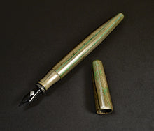 Load image into Gallery viewer, A Franklin-Christoph 66 F-C SEY Chikurin Sumie Maki-e Bamboo FP with its cap off, on a black surface.