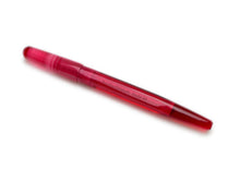 Load image into Gallery viewer, The Franklin-Christoph Model 66 Septagonal Ruby fountain pen lies diagonally on a white background.