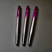 Load image into Gallery viewer, Three Franklin-Christoph Model 66 Amethyst pens with block threads are lined up on a gray surface.