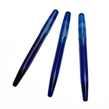 Load image into Gallery viewer, Three Franklin-Christoph Model 66 Septagonal Sapphire fountain pens with caps are arranged diagonally on white.