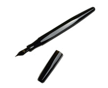 Load image into Gallery viewer, Franklin-Christoph Model 66 Septagonal Fountain Pen in Onyx shown uncapped with block threads on a white background.