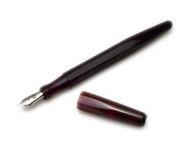 Load image into Gallery viewer, Franklin-Christoph Model 66 Septagonal Fountain Pen in Garnet, uncapped, beside the cap on a white background.