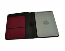 Load image into Gallery viewer, Franklin-Christoph Scottish Canvas Padfolio with red pockets, gray spiral notebook, and a circular cover design.