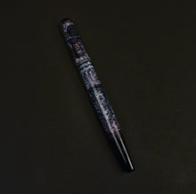 Load image into Gallery viewer, The Franklin-Christoph 65 A.A. Vacharat Medieval Castle pen rests diagonally on a dark, plain background.
